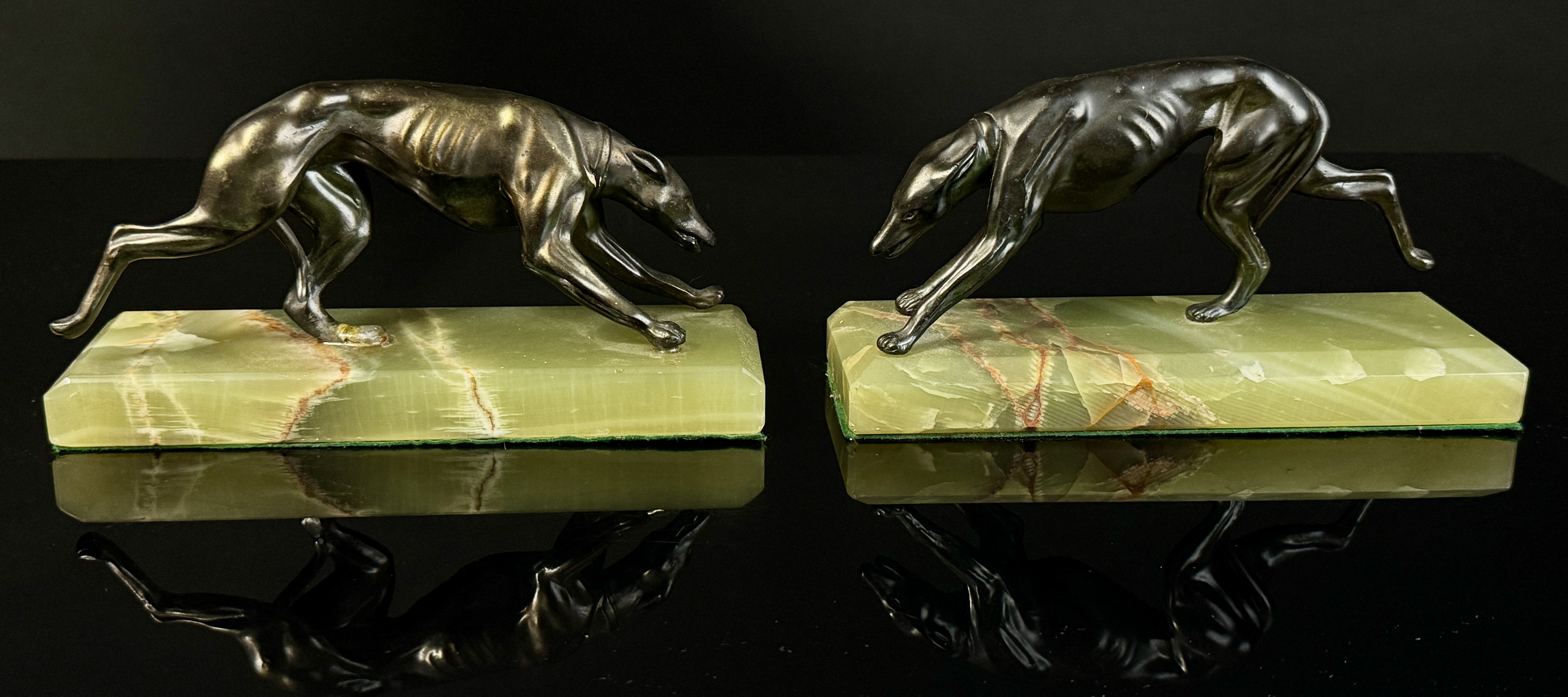 A Pair of Art Deco Bronze Greyhound Bookends on Onyx Bases