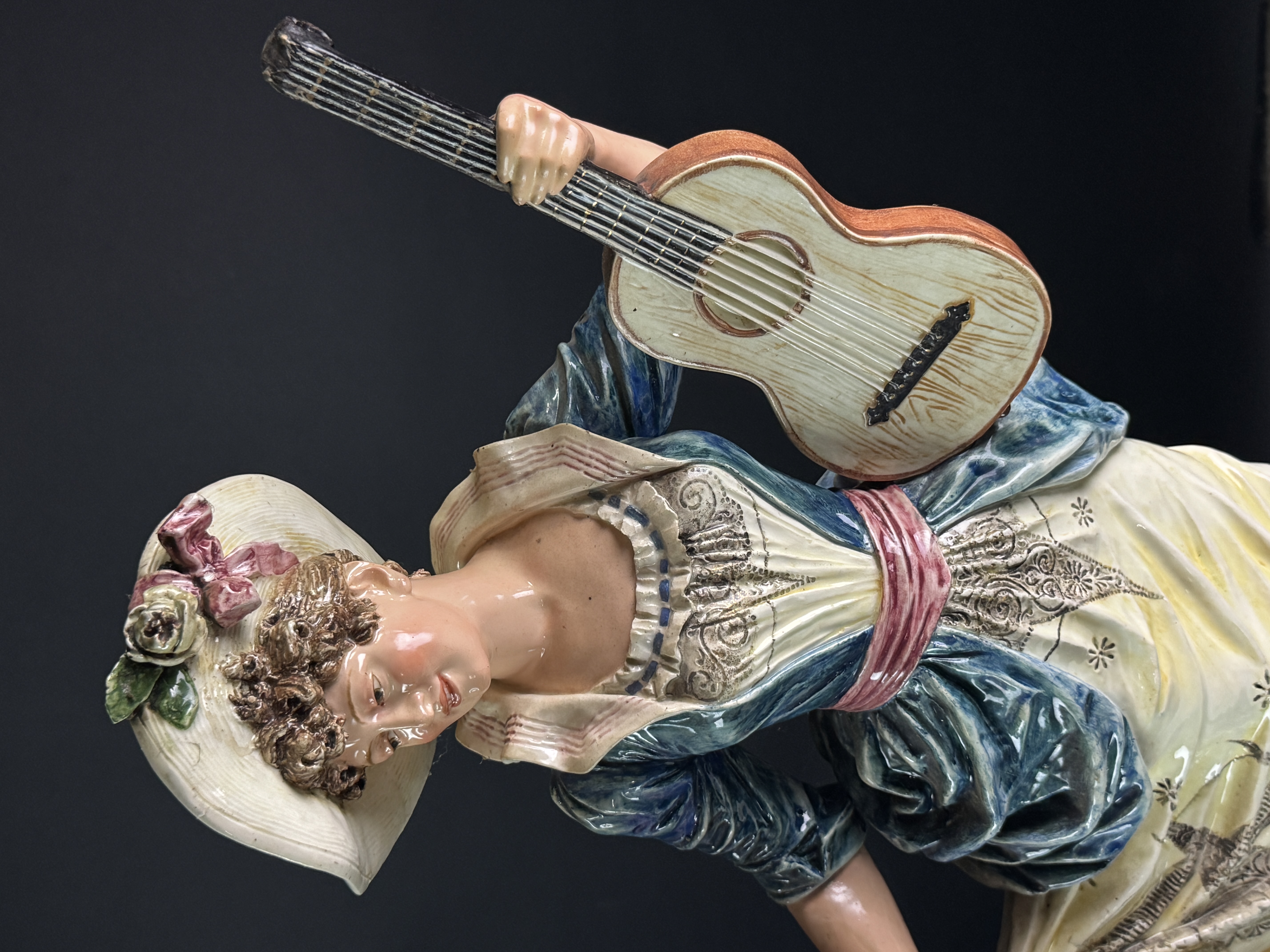 A Pair of Large Continental Polychrome Porcelain Musician Figurines