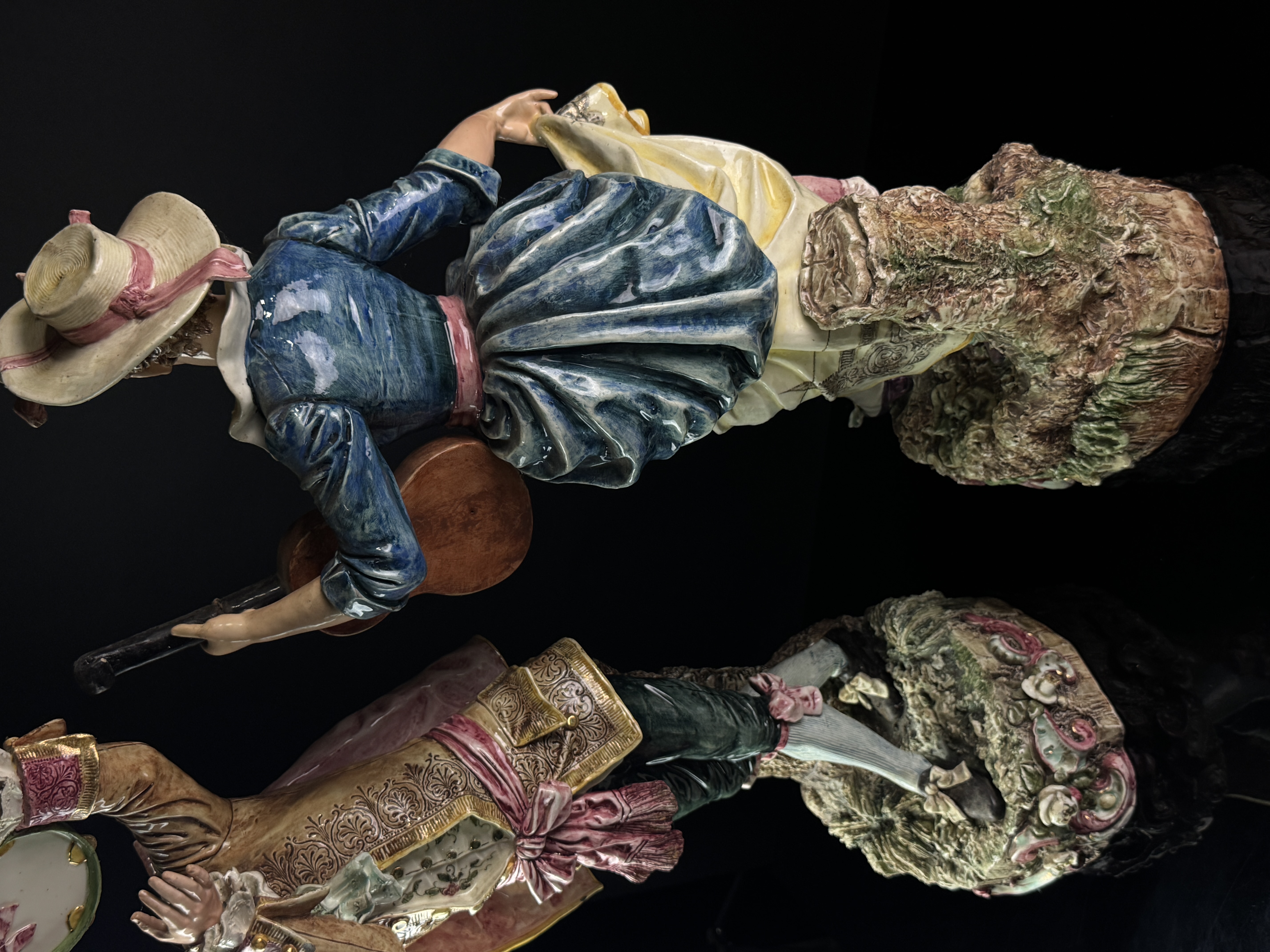 A Pair of Large Continental Polychrome Porcelain Musician Figurines