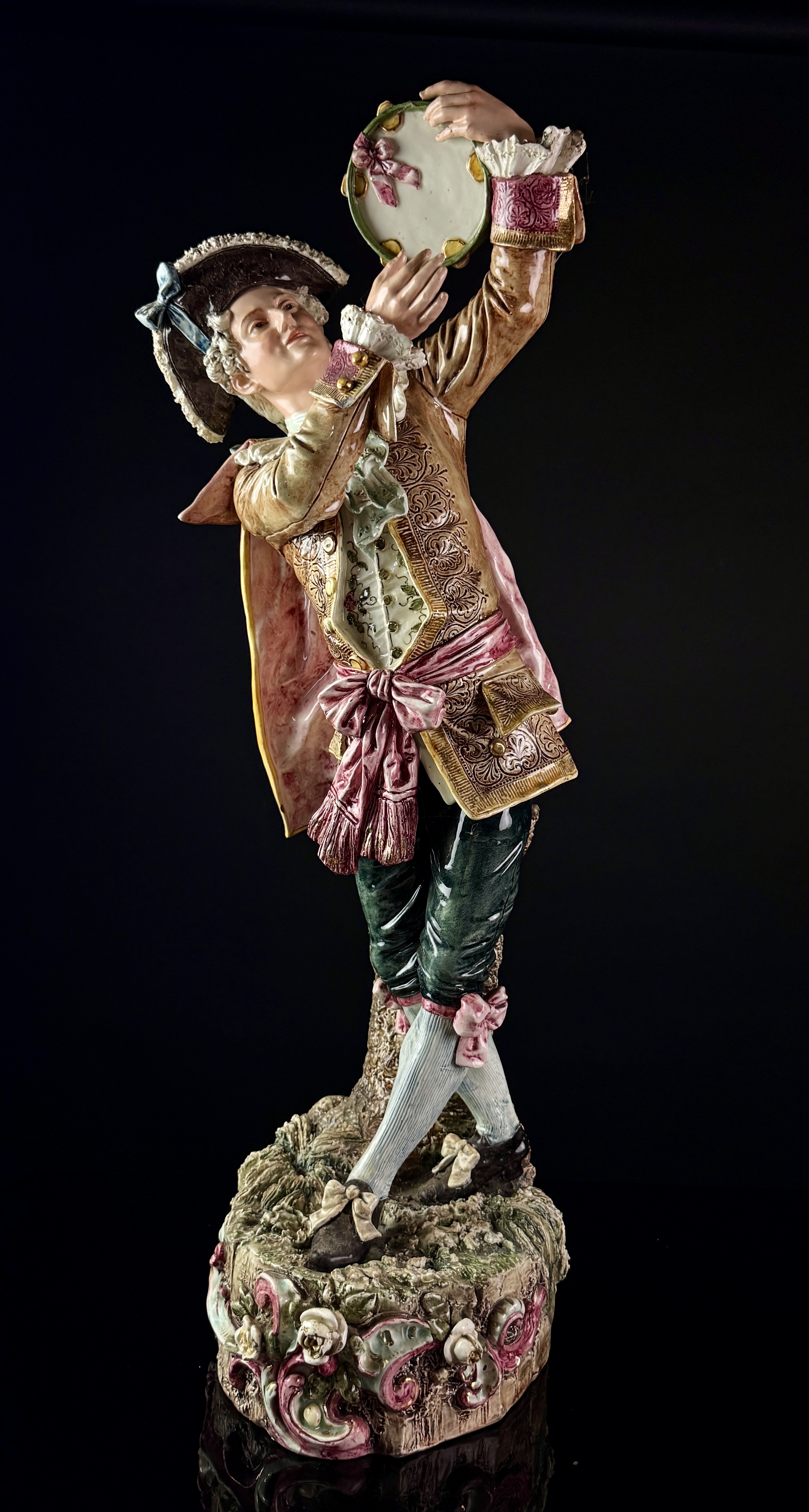 A Pair of Large Continental Polychrome Porcelain Musician Figurines