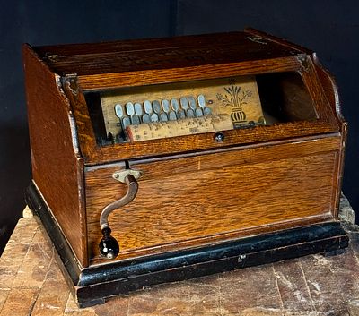 Chautauqua Roller Organ by the Autophone Company. This antique tabletop mechanical musical 