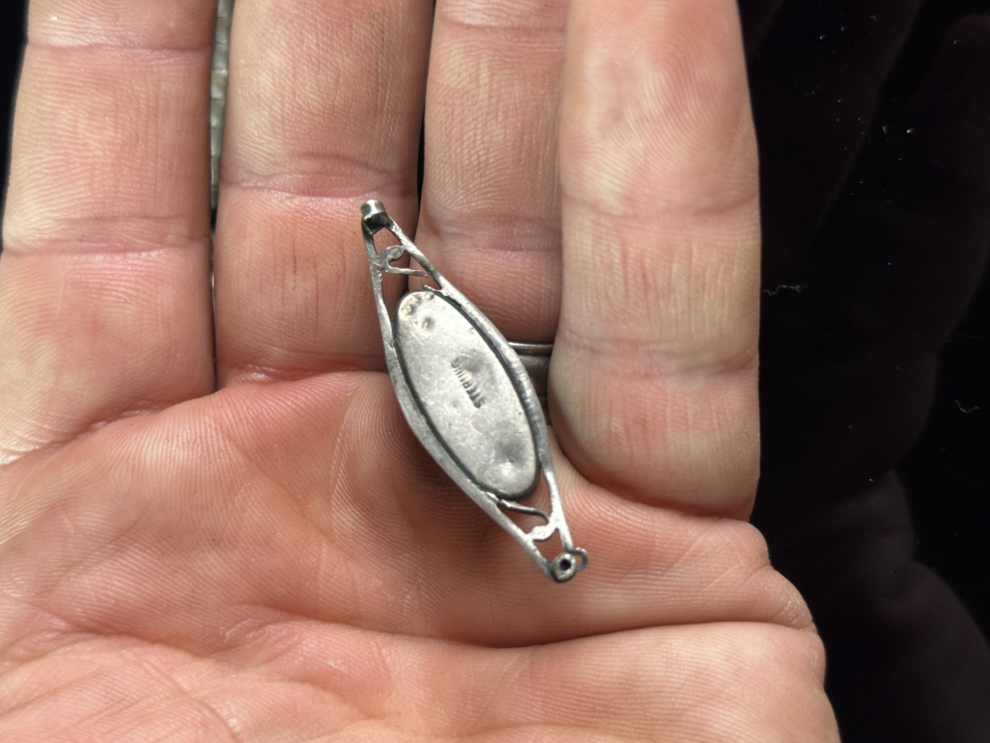 A Collection of Silver Jewelry Including Art Deco Style Brooches and Tribal Style Beads