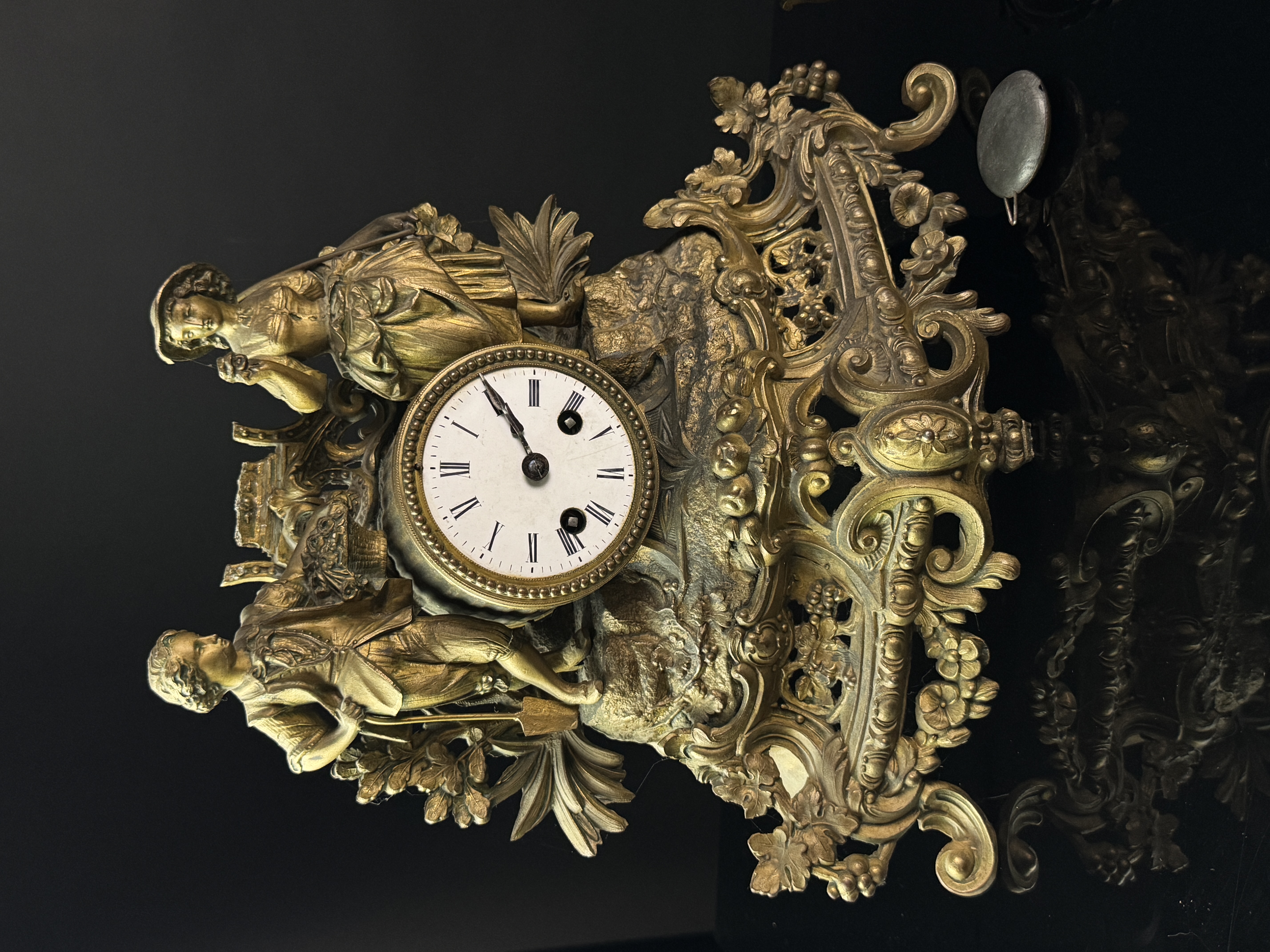 Two 19th Century French Gilt Metal Figural Mantel Clocks