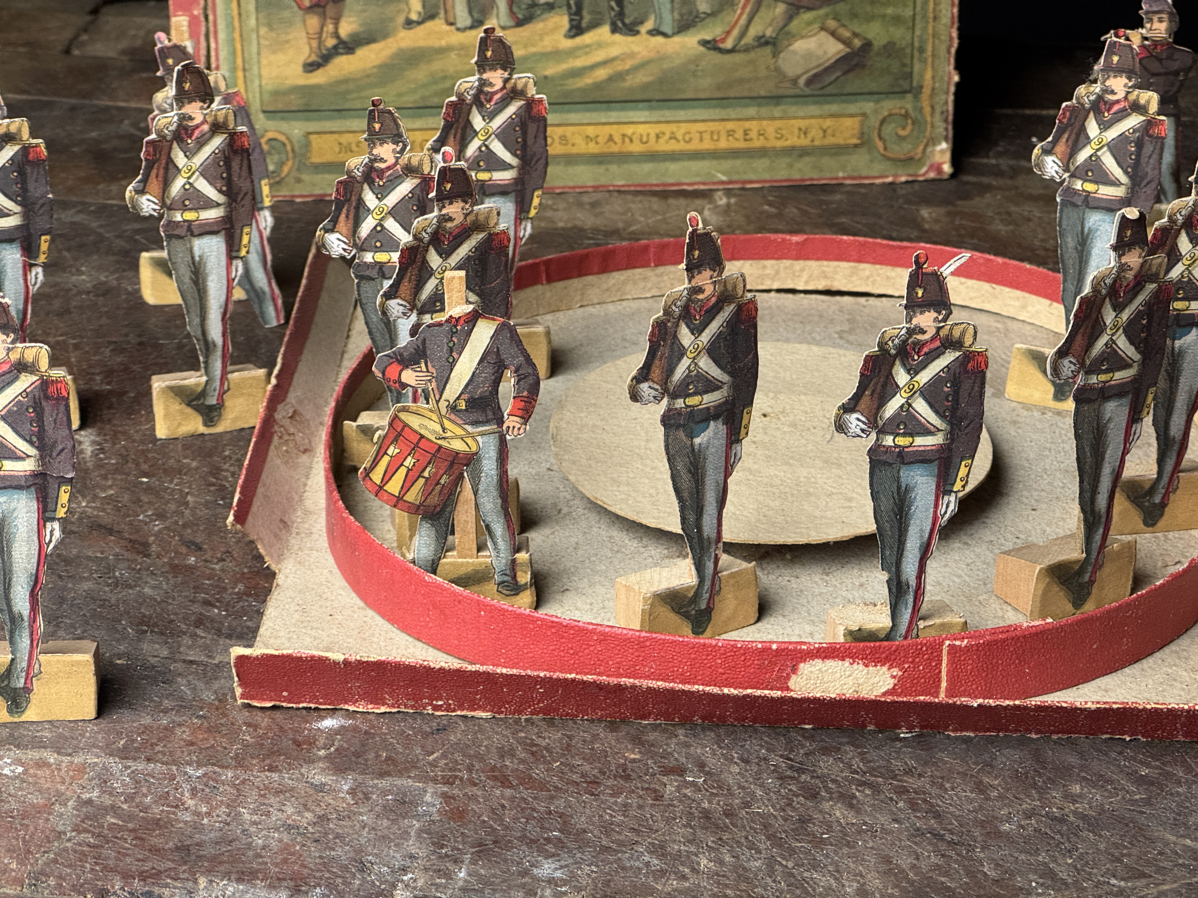 A Set of McLoughlin Bros. 9th Regt. National Guards Mechanical Paper Soldiers with Box Lid