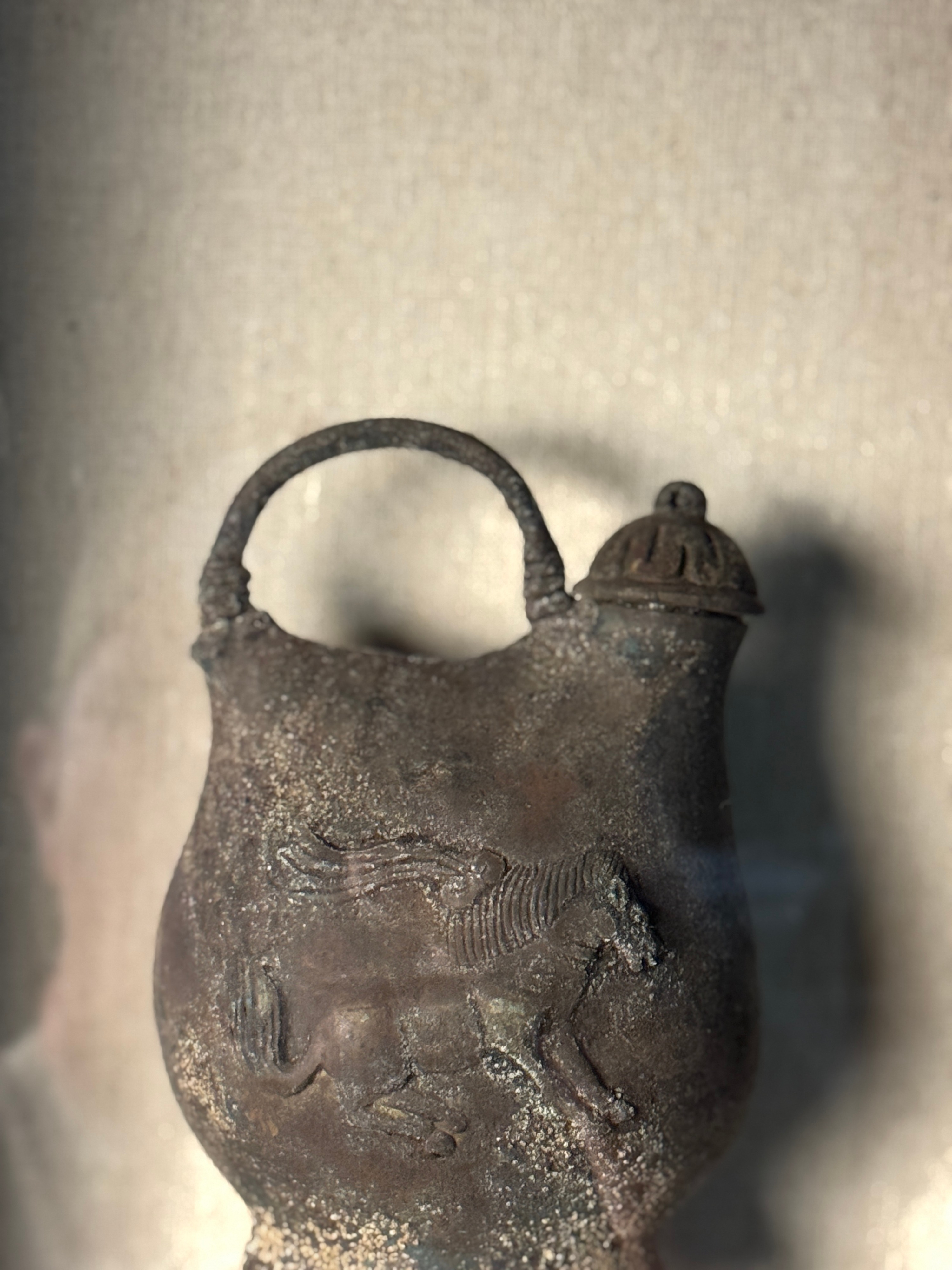 Cast Metal Oinochoe Vessel with Winged Quadruped Relief in Shadow Box Frame