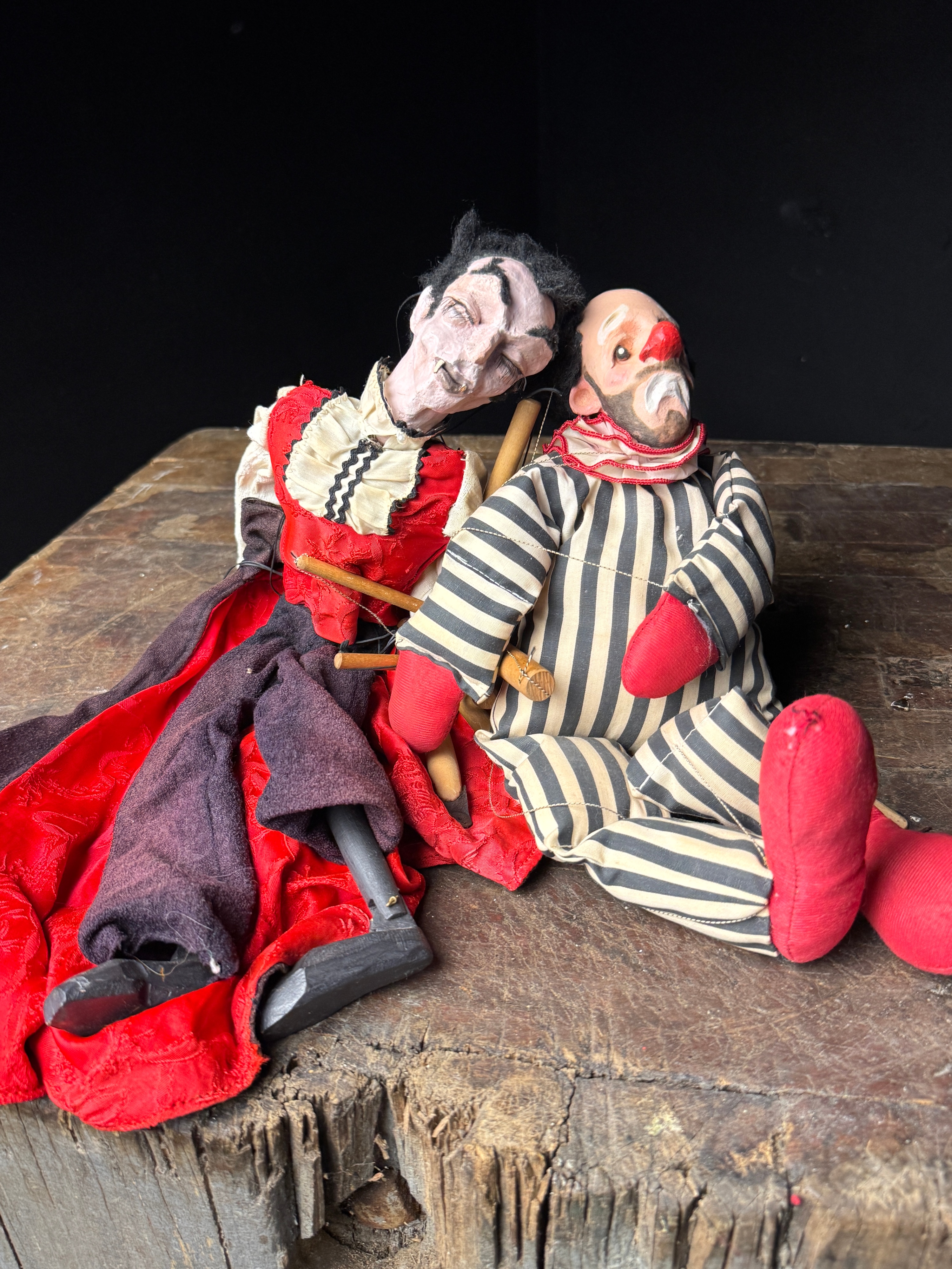 A Pair of Vintage Composition and Wood Marionettes Featuring Vampire and Sad Clown Characters