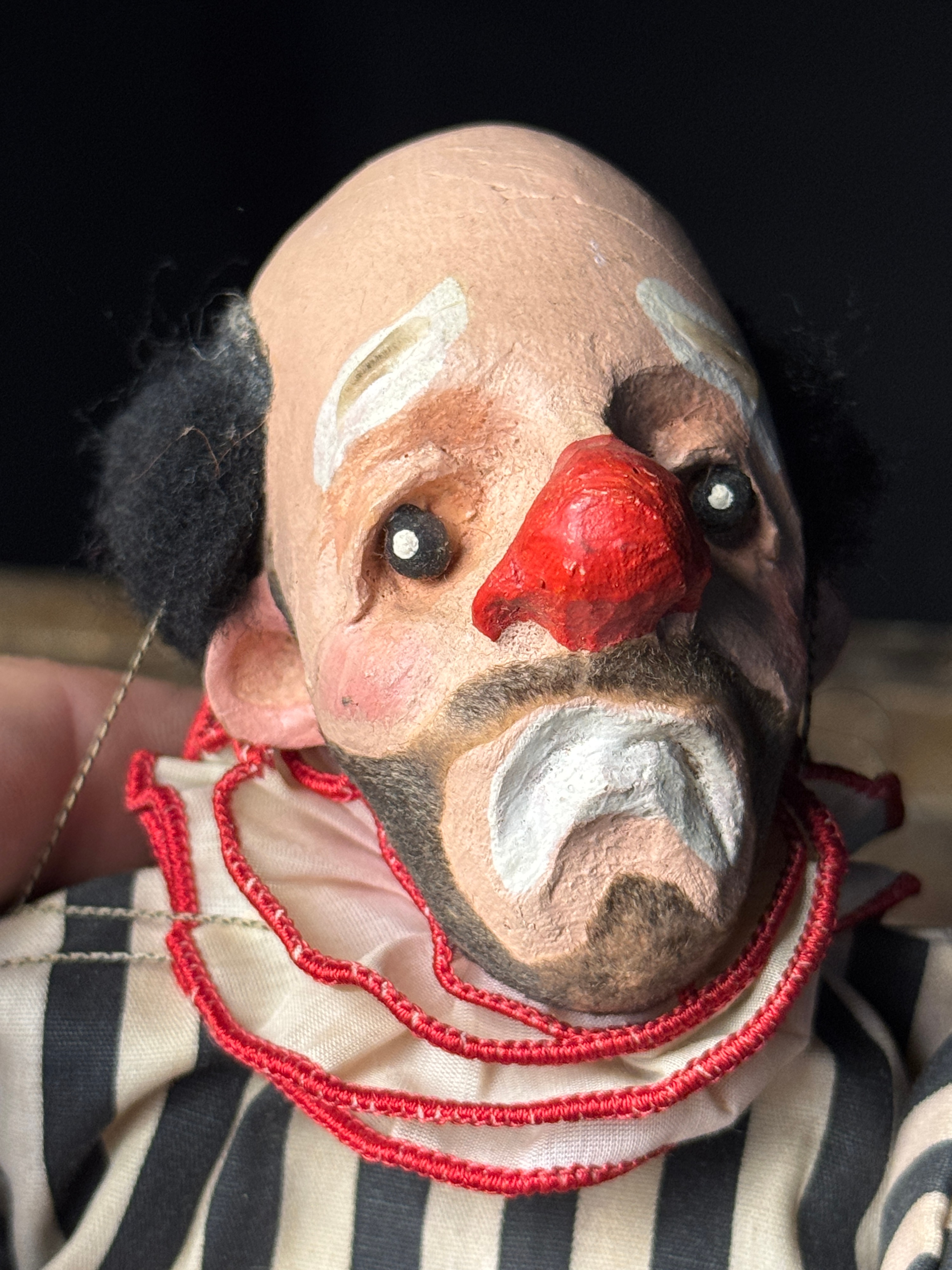A Pair of Vintage Composition and Wood Marionettes Featuring Vampire and Sad Clown Characters