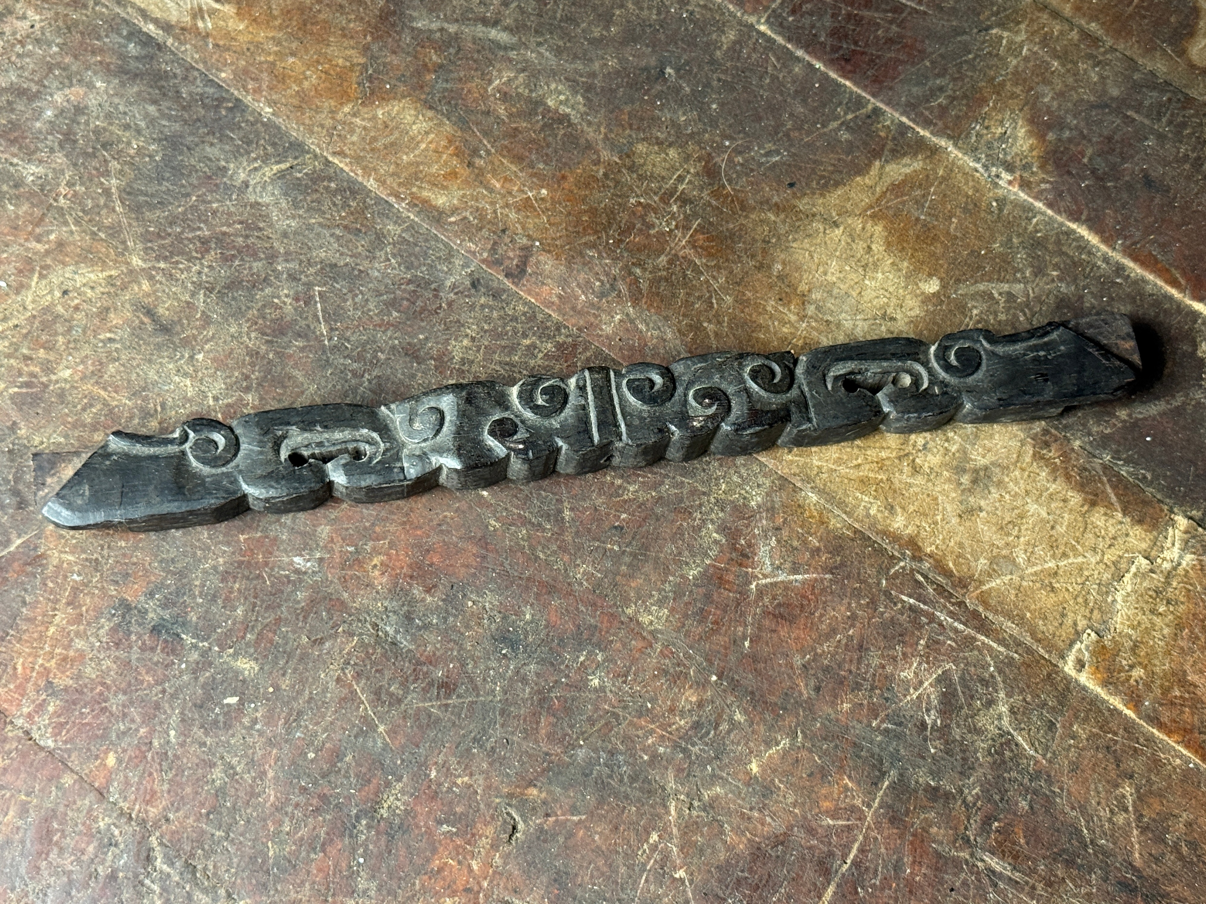 Carved Hardwood Decorative Border Element with Archaic Scroll Motifs