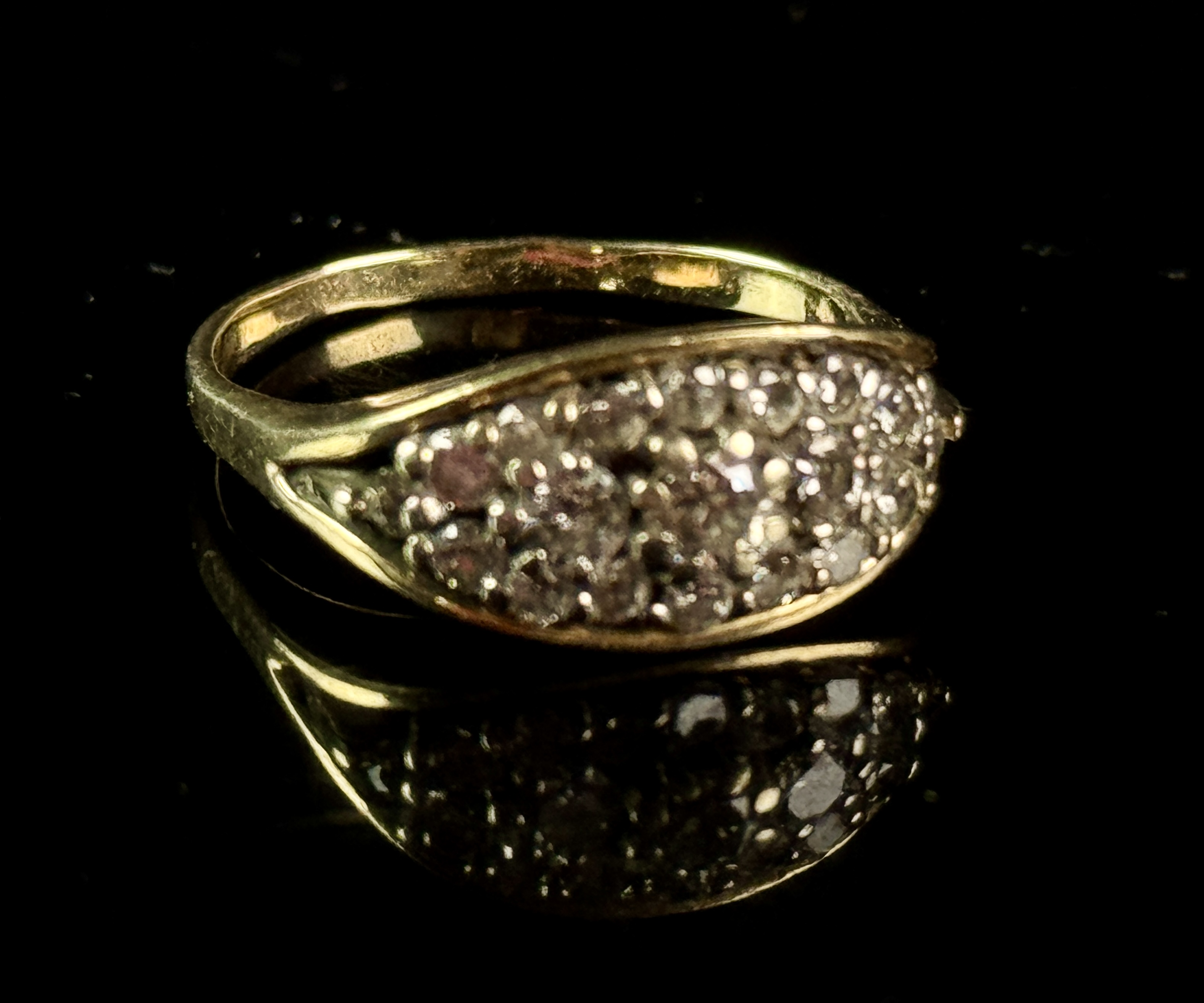 A 14 Karat Yellow Gold and Diamond Marquise Cluster Cocktail Ring
