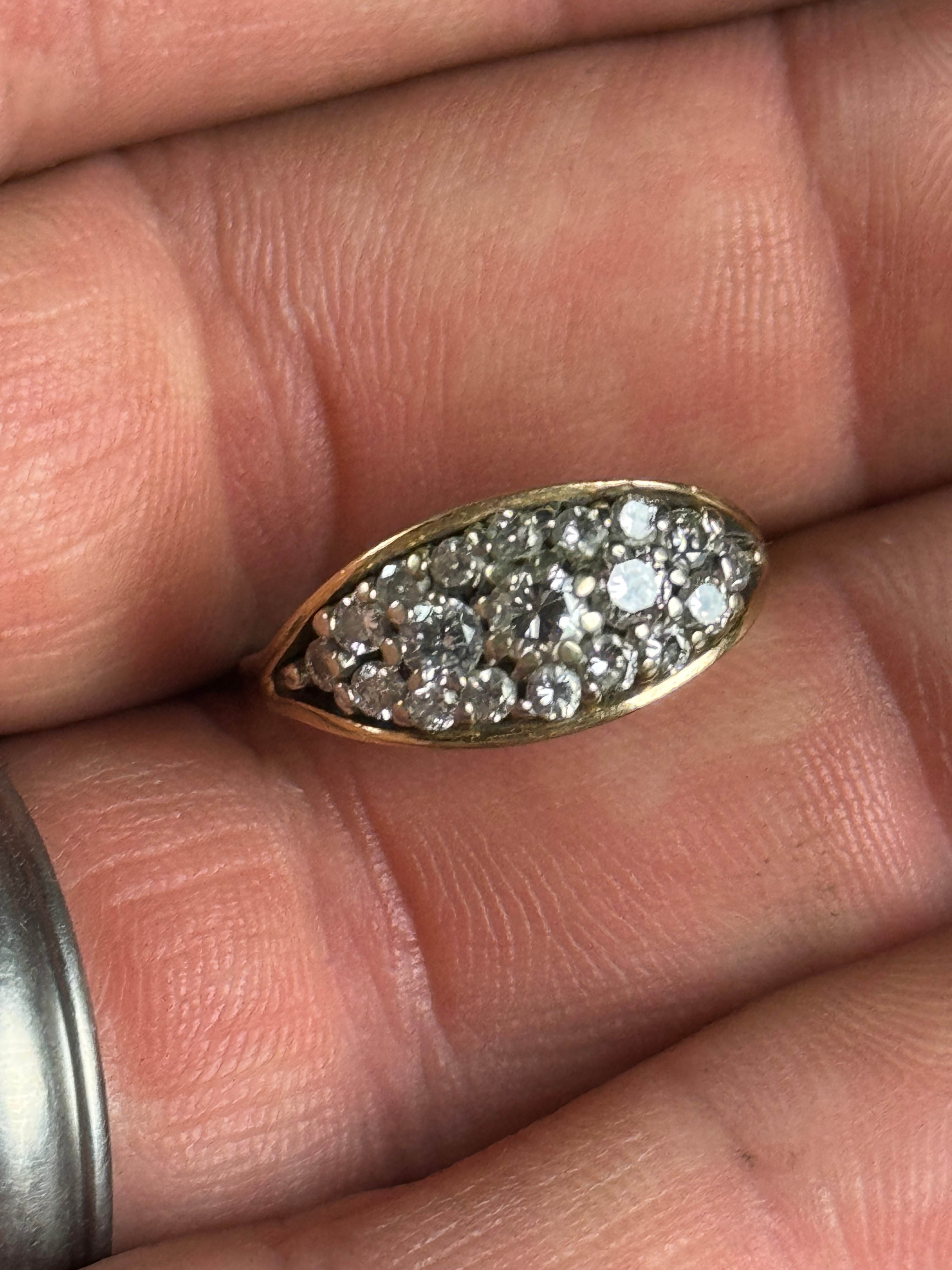 A 14 Karat Yellow Gold and Diamond Marquise Cluster Cocktail Ring