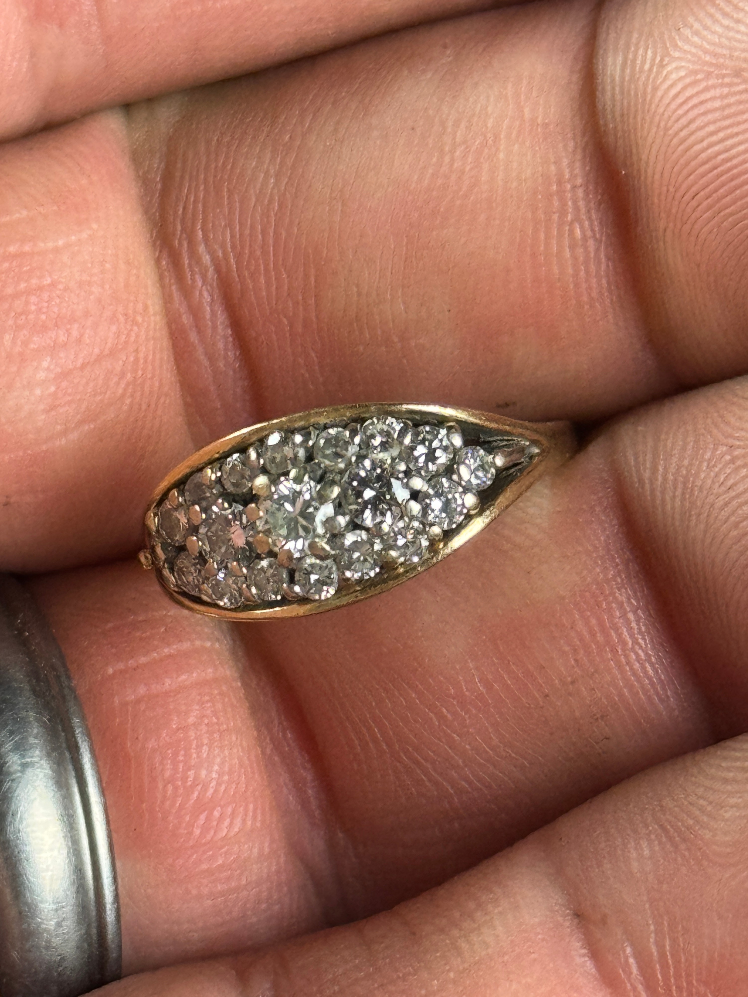 A 14 Karat Yellow Gold and Diamond Marquise Cluster Cocktail Ring