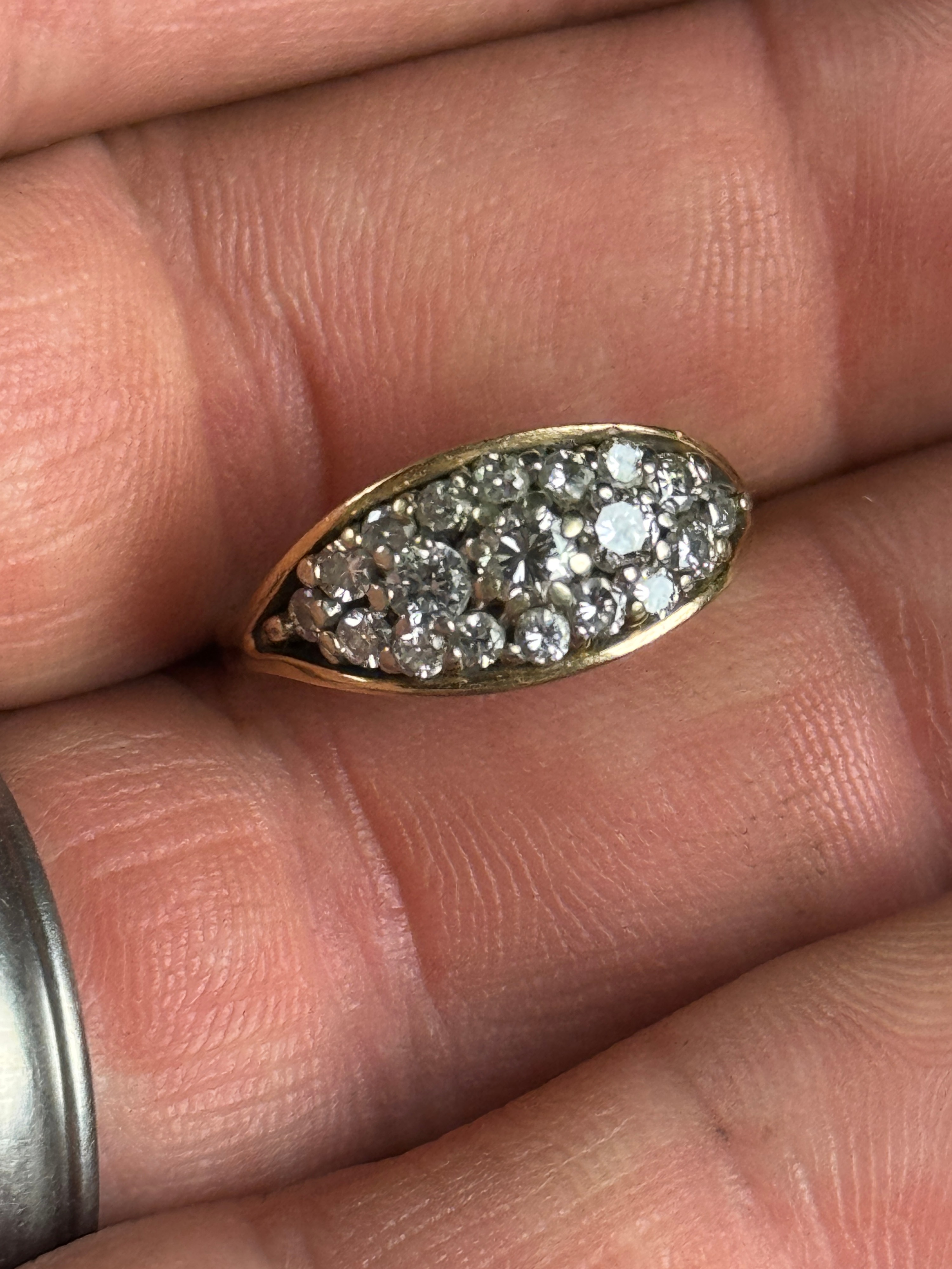 A 14 Karat Yellow Gold and Diamond Marquise Cluster Cocktail Ring