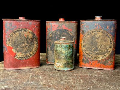 An Assortment of Antique Hazard Powder Co. and DuPont Gunpowder Tins. A collection of antique 