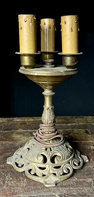 Art Deco Style Three-Light Cast Metal Candelabra Table Lamp. A three-light electric table lamp 