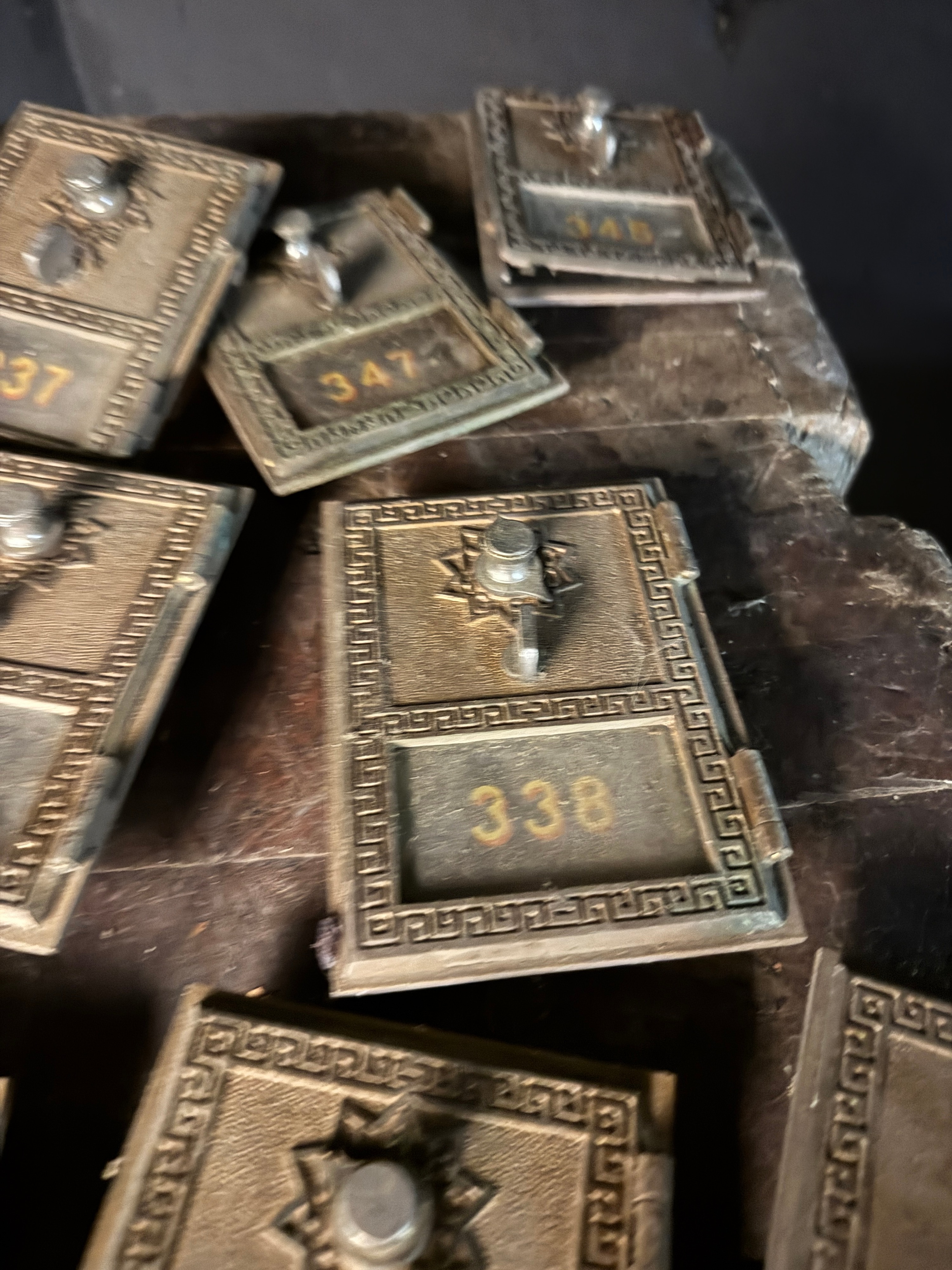 A Group of National Cast Brass Post Office Box Doors Dated 1955