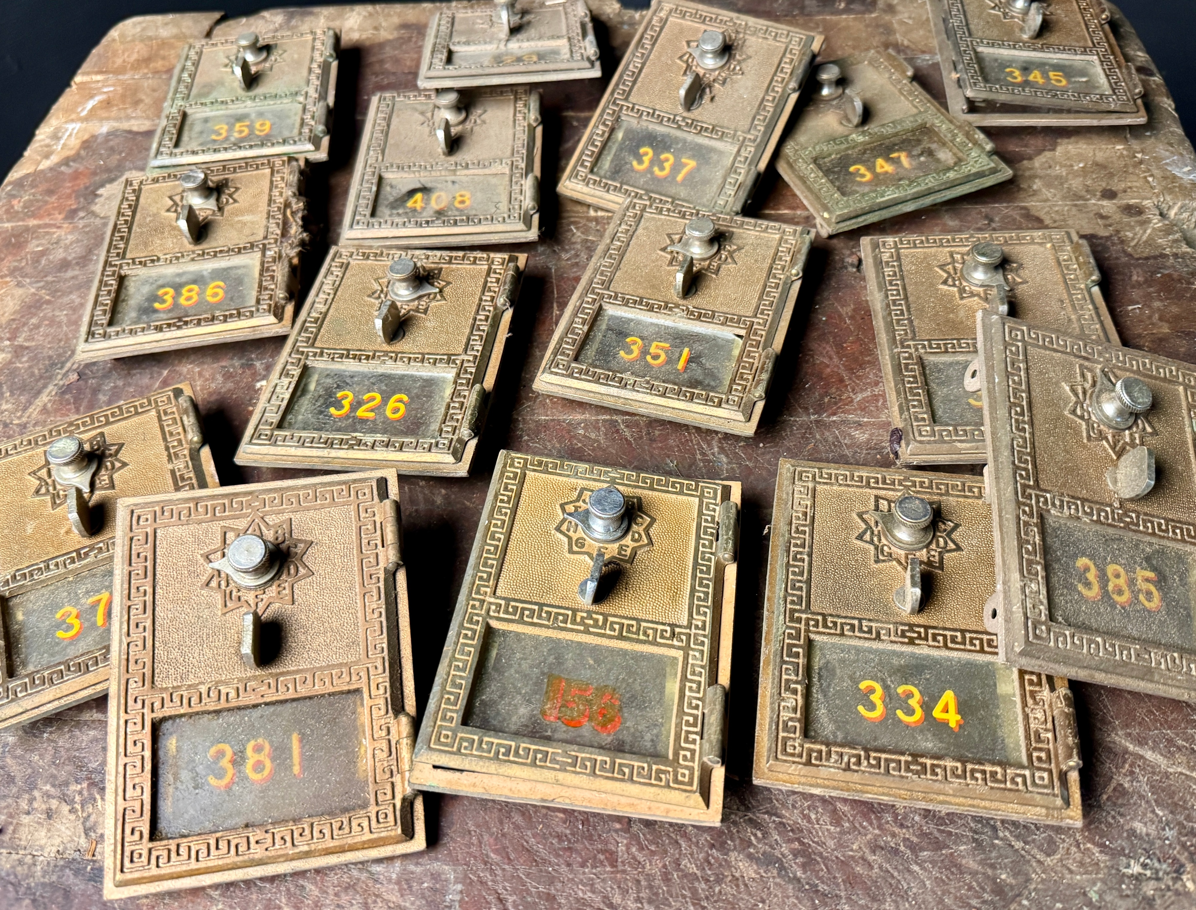 A Group of National Cast Brass Post Office Box Doors Dated 1955