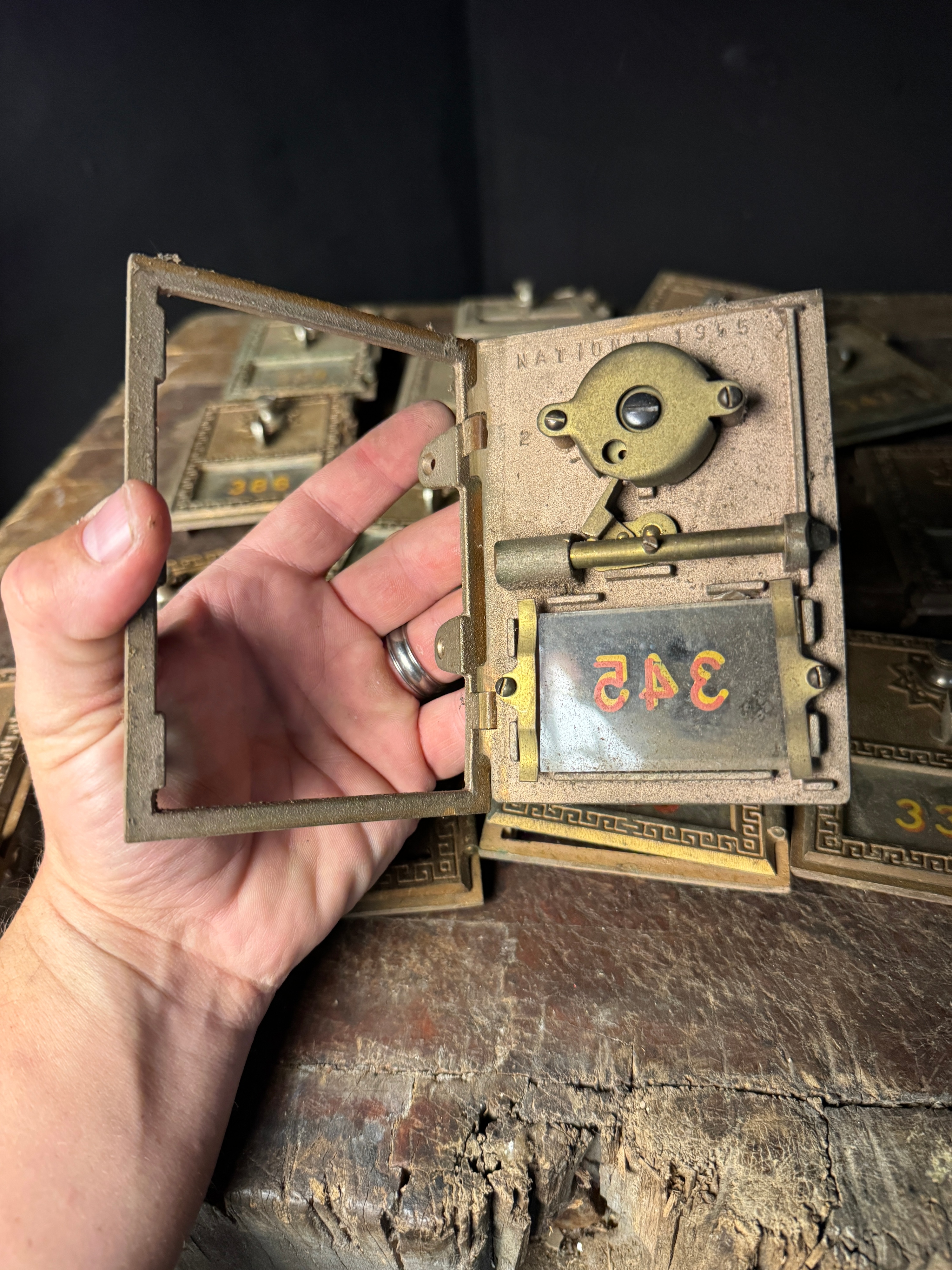 A Group of National Cast Brass Post Office Box Doors Dated 1955