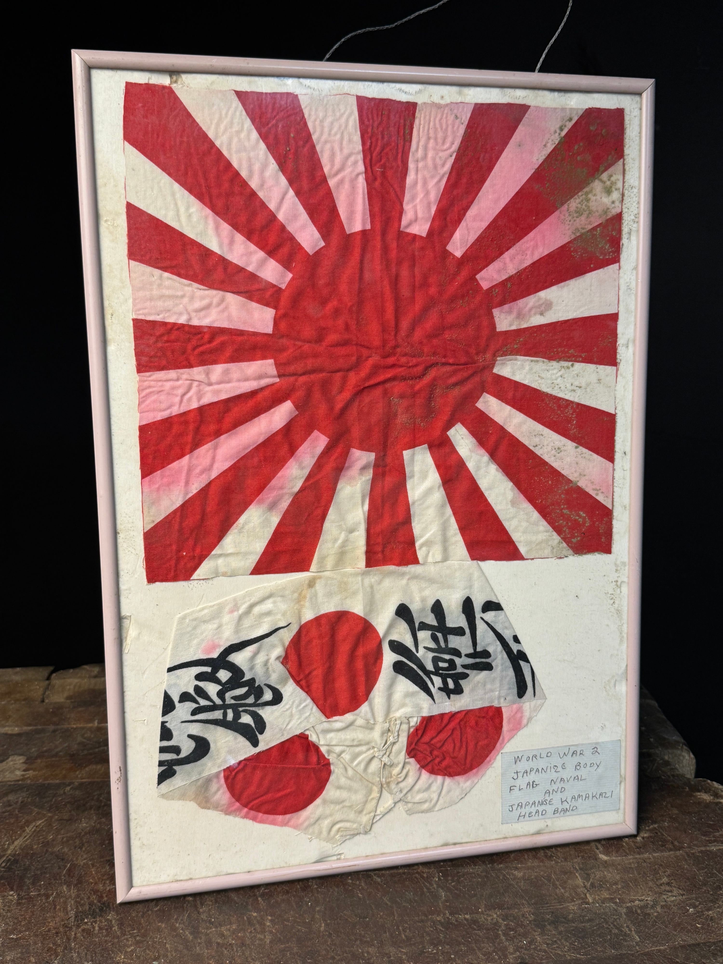 Two Framed World War II Imperial Japanese Textiles Including a Rising Sun War Flag and Kamikaze Hachimaki