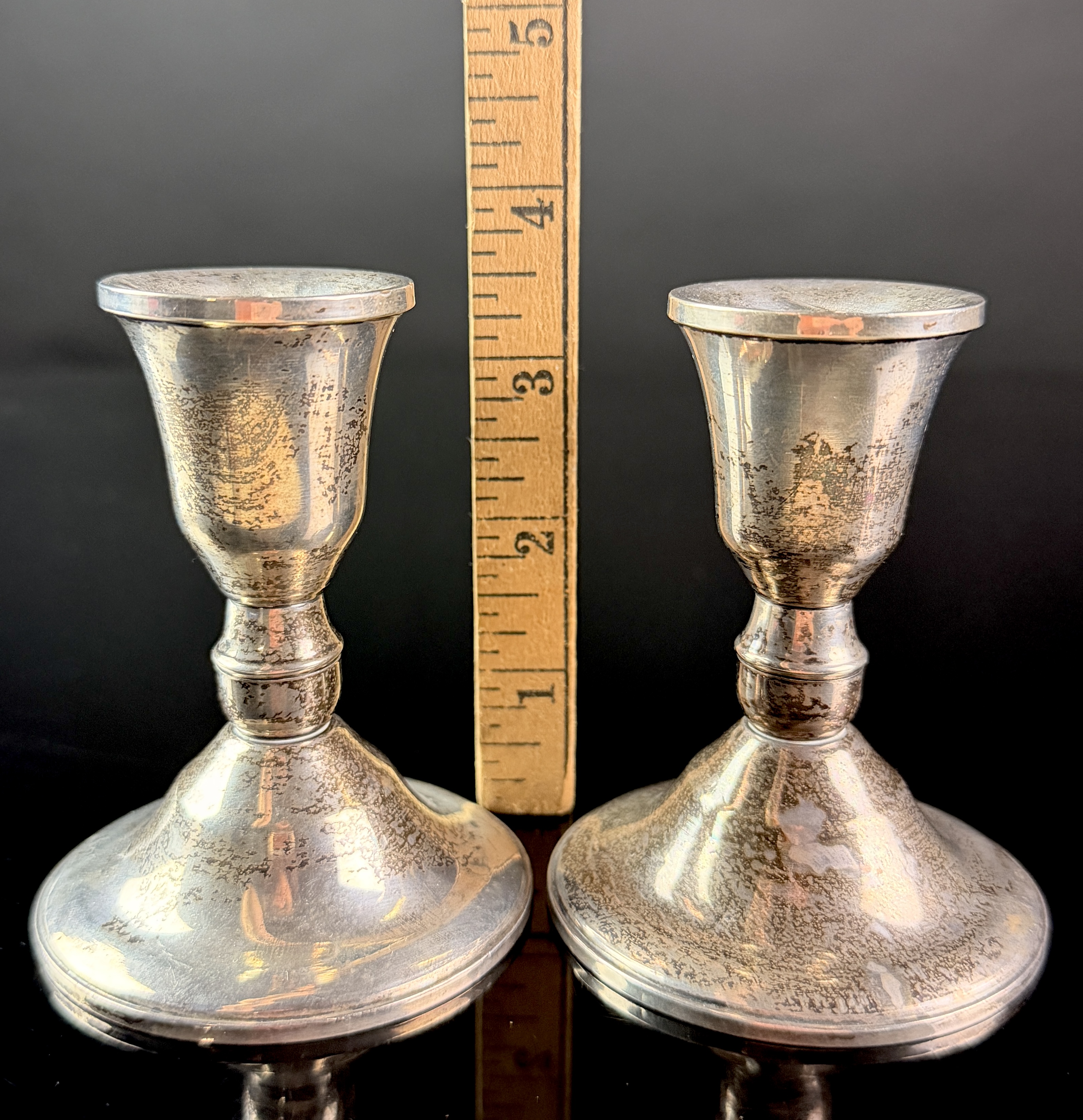 A Pair of Duchin Creation Sterling Silver Weighted Candlesticks