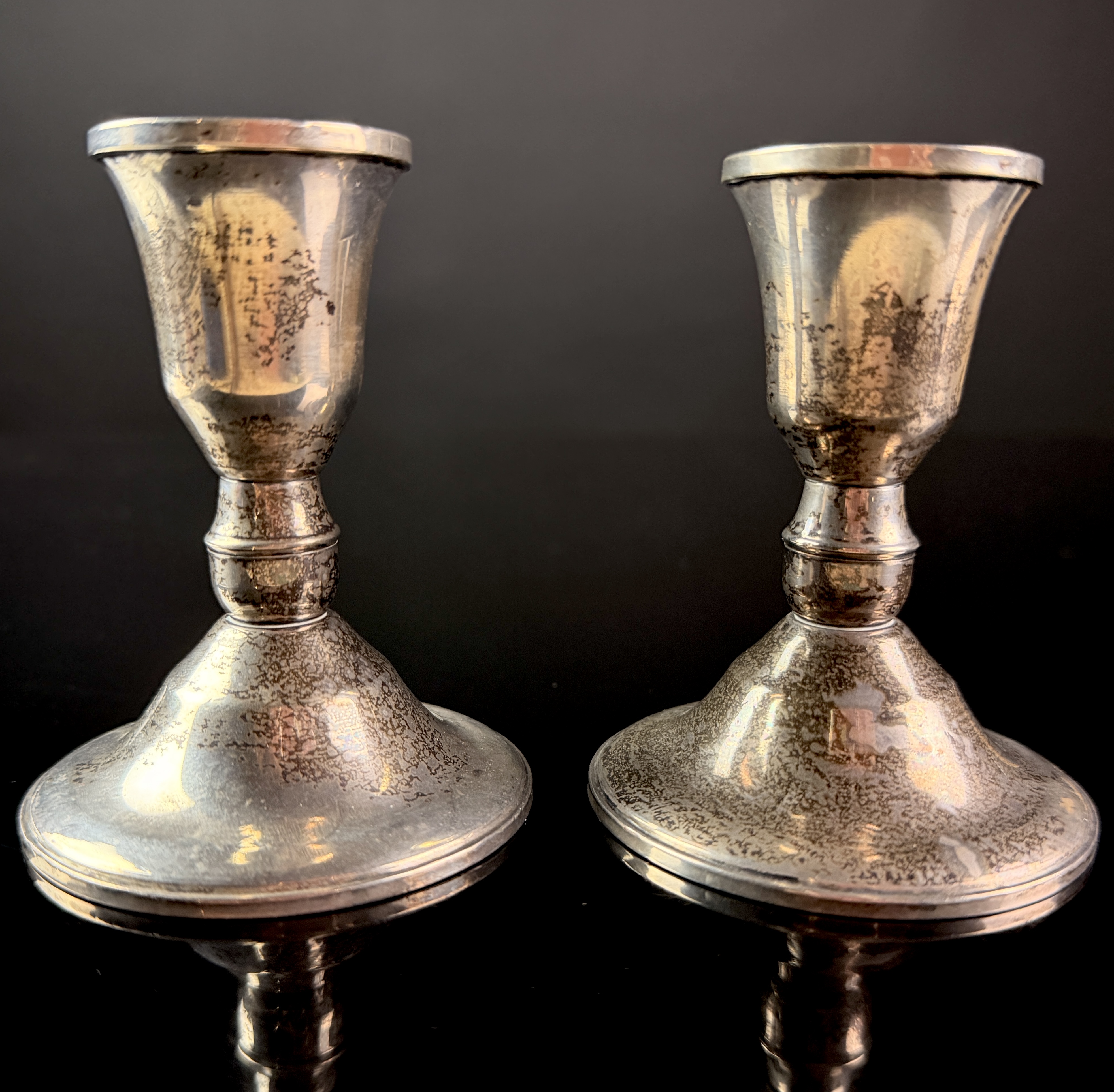 A Pair of Duchin Creation Sterling Silver Weighted Candlesticks