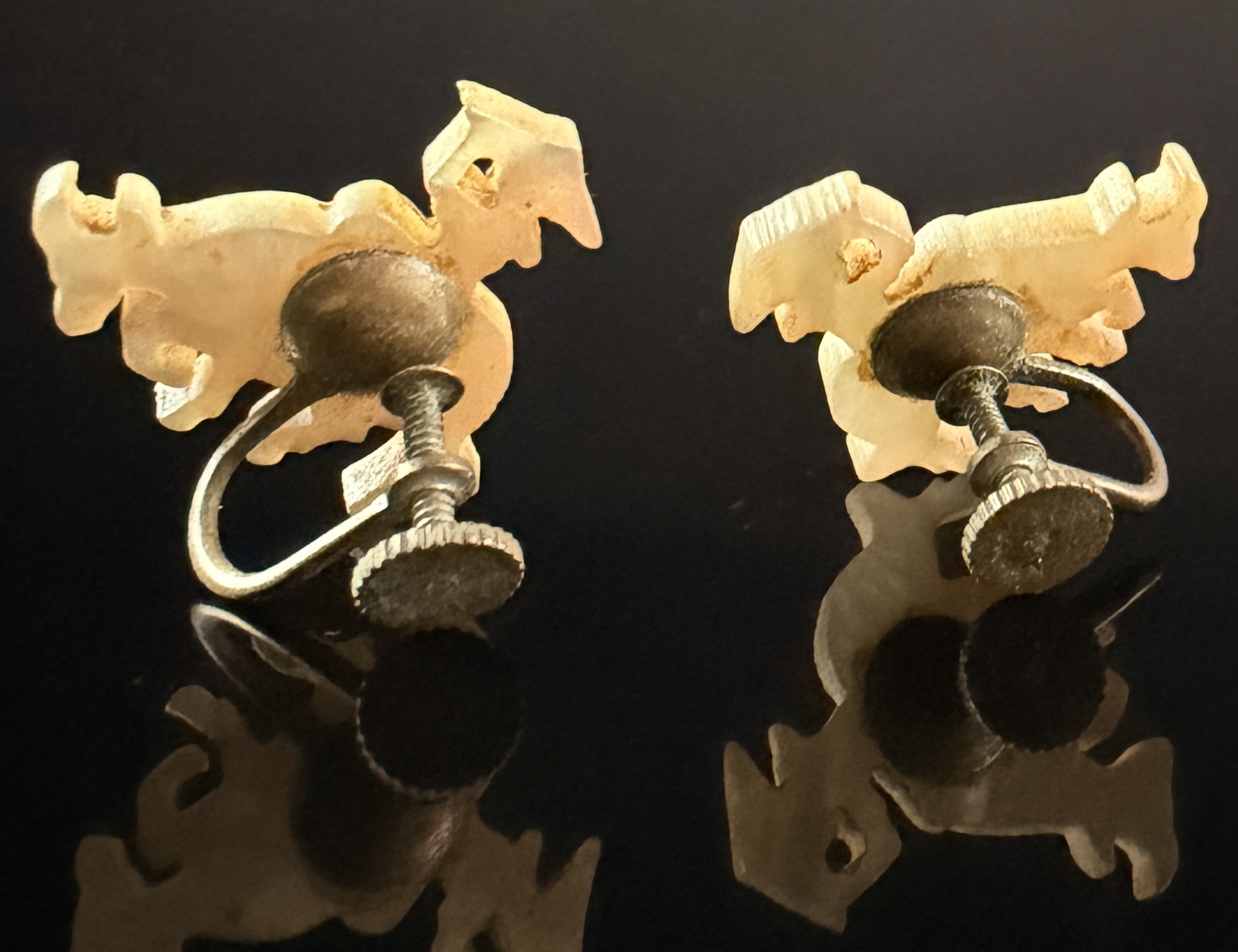 A Pair of Japanese Hand-Carved Mother-of-Pearl Water Buffalo Earrings