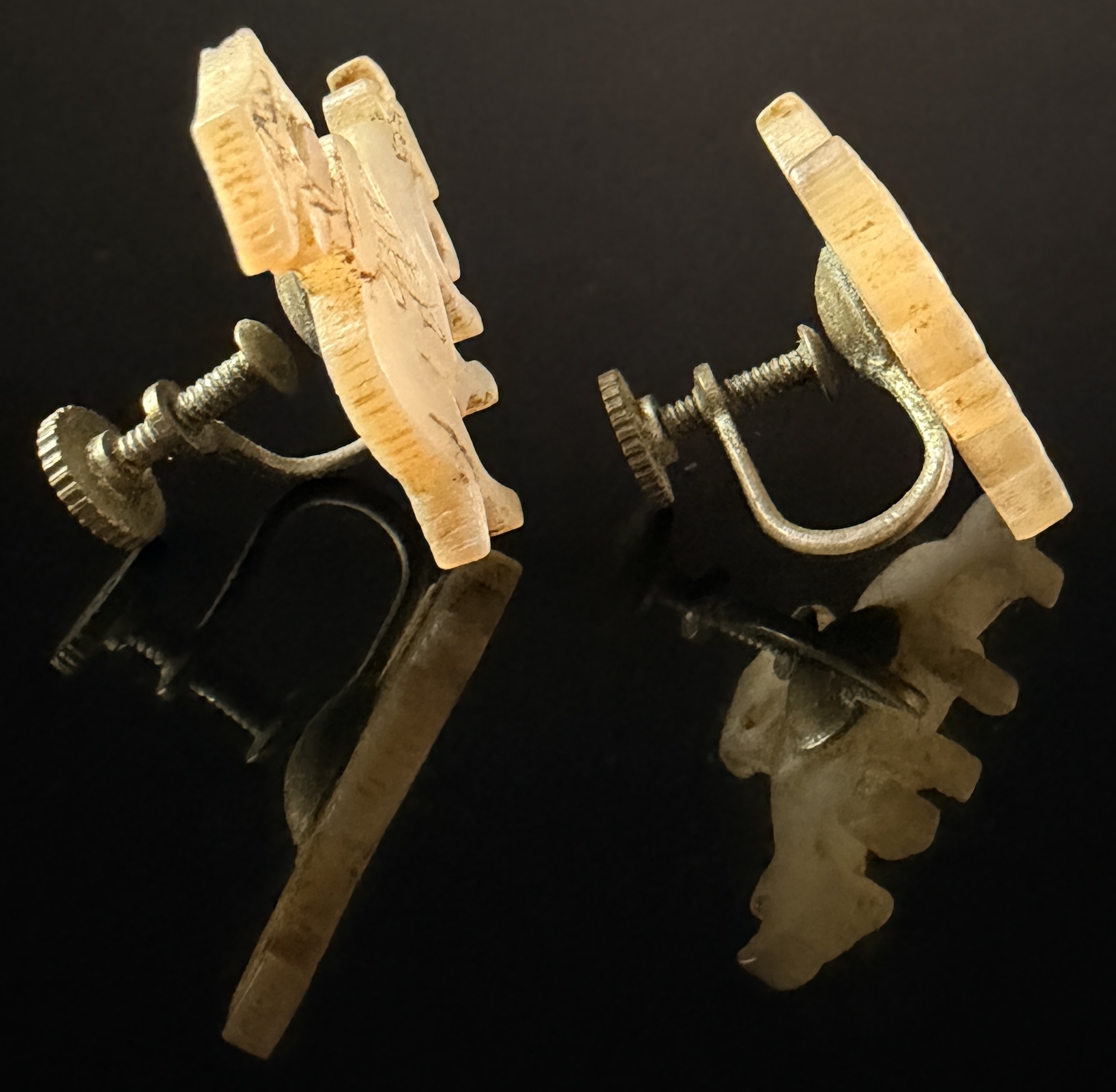 A Pair of Japanese Hand-Carved Mother-of-Pearl Water Buffalo Earrings