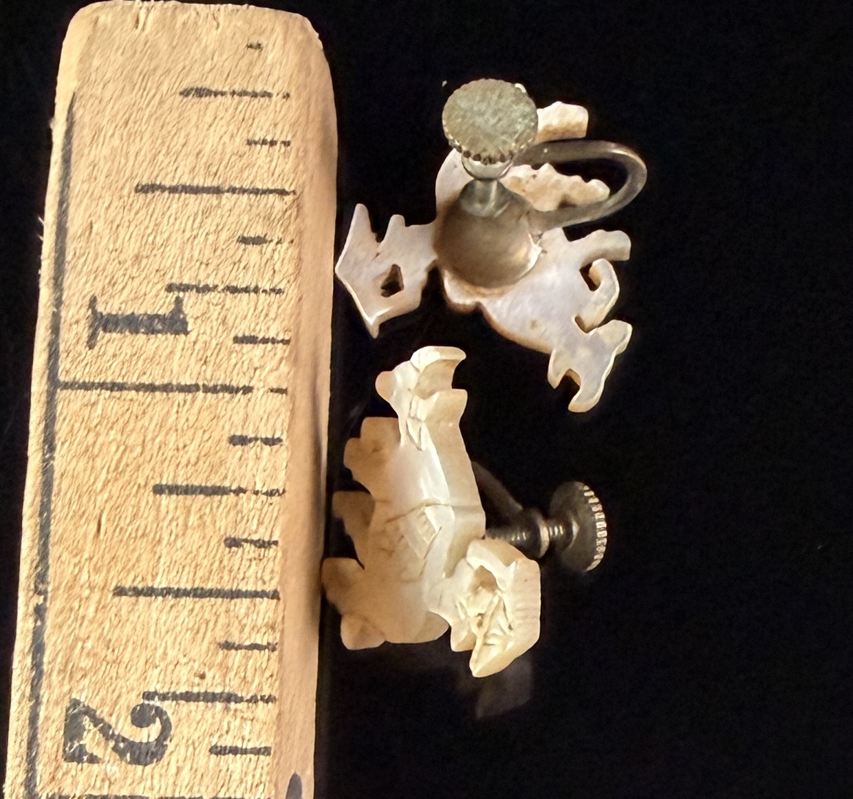A Pair of Japanese Hand-Carved Mother-of-Pearl Water Buffalo Earrings