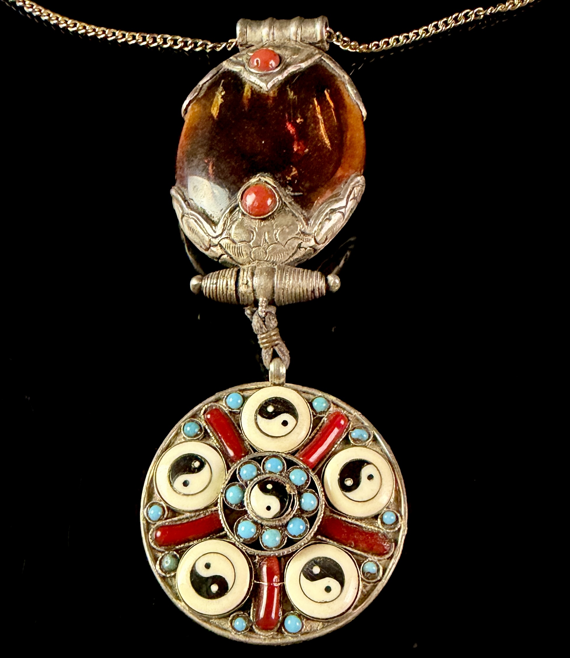 Tibetan Style Articulated Silver Toned Pendant Necklace with Amber Coral and Turquoise