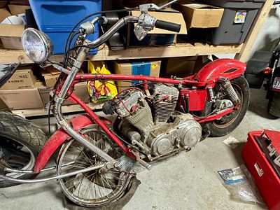 Custom Chopper Motorcycle with Harley-Davidson Evolution Engine. A custom-built chopper-style 