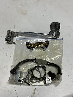 An Assortment of Harley-Davidson Chrome Motorcycle Parts and Accessories. This group comprises 