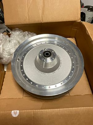 Drag Specialties Solid Disc Cast Aluminium Motorcycle Wheel. A solid disc-style motorcycle wheel 