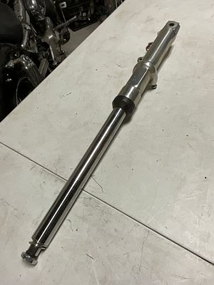 Single Polished Front Fork Assembly for Cruiser Motorcycles. This is a single front fork 