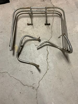 A Set of Vintage Chrome Rear Luggage Rack and Saddlebag Guard Rails. This set comprises a 