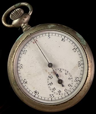 Vintage Swiss Made Open Face Mechanical Stopwatch. A vintage open-face mechanical stopwatch 