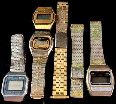 A Collection of Vintage Digital LCD Quartz Wristwatches and Metal Bands. A group of vintage 