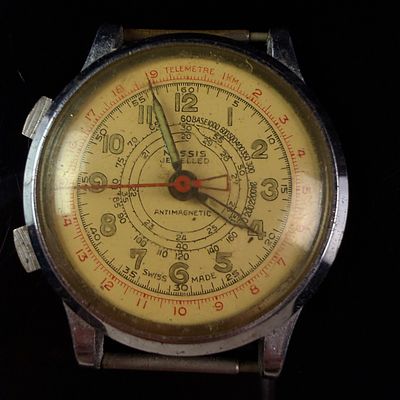 Vintage Swiss Nassis Base Metal Chronograph Wristwatch For Parts. A vintage Swiss-made base 