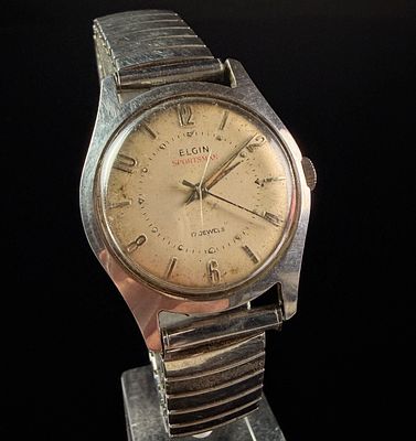 Elgin Sportsman Stainless Steel Seventeen Jewel Manual Wind Wristwatch. This French-cased Elgin 