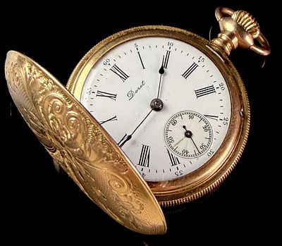 Doret Hunter Case Pocket Watch in 14K Gold Filled Bates and Bacon Regal Case. A Swiss-type 