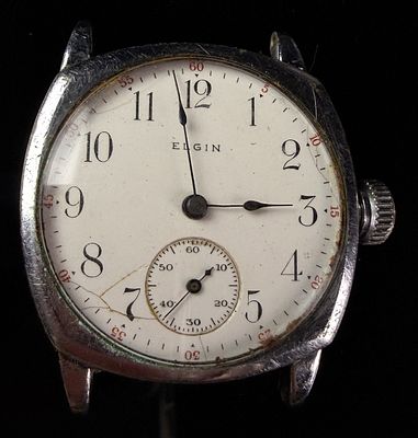 Elgin Manual Wind Cushion Case Wristwatch with Porcelain Dial. This antique manual wind 