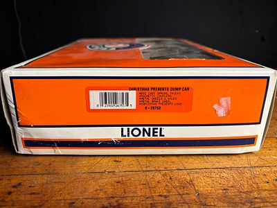 Lionel O Gauge Christmas Presents Dump Car 6-26753 in Original Box. A Lionel O gauge Christmas 