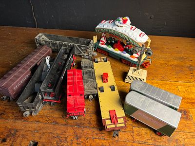 A Collection of Assorted O-Gauge Model Train Rolling Stock and Accessories by Lionel, MTH, and 