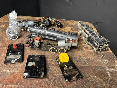 A Collection of American Flyer O-Gauge Model Train Locomotives and Parts. An assortment of 