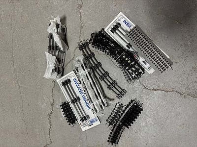 A Collection of O Gauge Model Train Track Sections by K-Line and Lionel. An assortment of O 