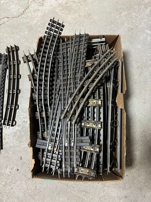 An Assortment of Lionel and GarGraves O-Gauge Model Train Track and Switches. A collection of 