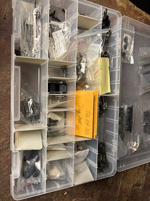 A Collection of Vintage O-Gauge Model Train Repair Parts and Components. An assortment of 