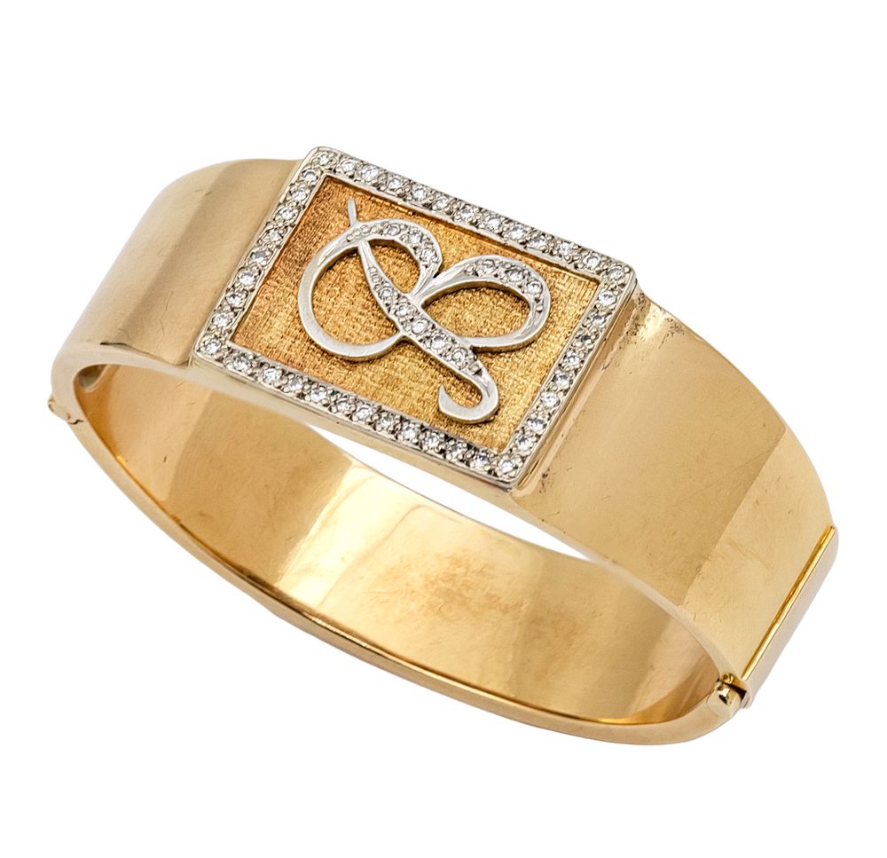 18k Yellow Gold Diamond Bracelet. 
With the letter B set with 53 diamonds in total weight of 