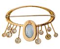 14k Yellow Gold Opal and Diamond Brooch. 
Oval opal - 18x12mm. 
Eight diamonds in total weight Image - 3