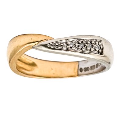 9k Yellow and White Gold Diamond Ring. 
Set with four diamonds in total weight of about 