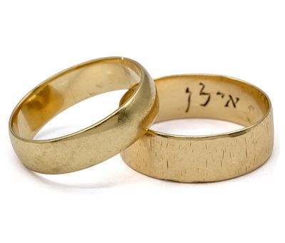 Two 14k Gold Wedding Rings Bands. 
One ring size 6.5, the other 5.25. 
5.46gr.