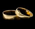 Two 14k Gold Wedding Rings Bands. 
One ring size 6.5, the other 5.25. 
5.46gr.Image - 2